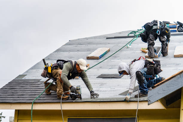 Professional Gutter Installation technician working in Spencerville, IN